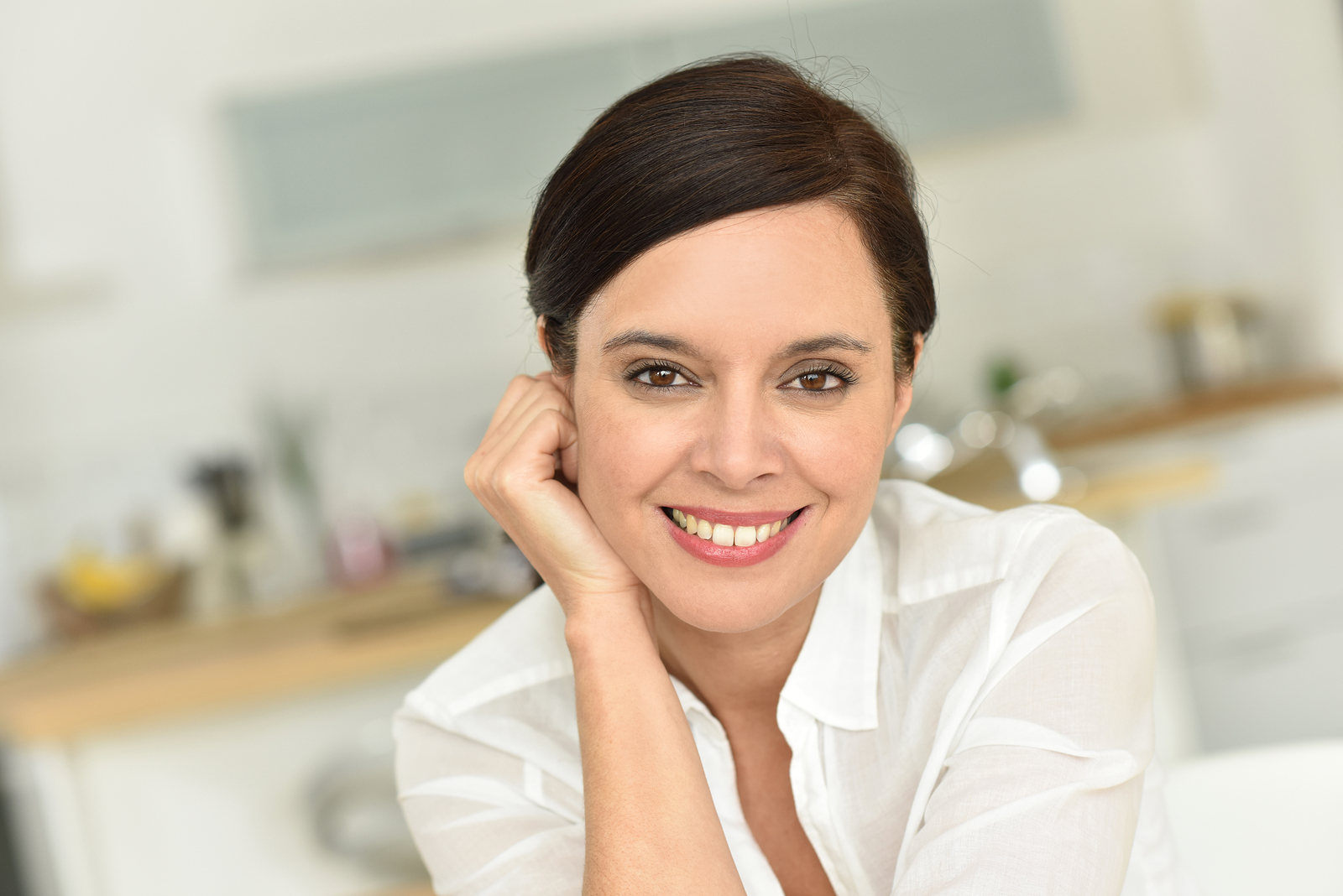 Portrait of attractive 40-year-old woman at home